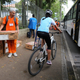A public cleaner carries an electronic ballot box in Rio de Janeiro.